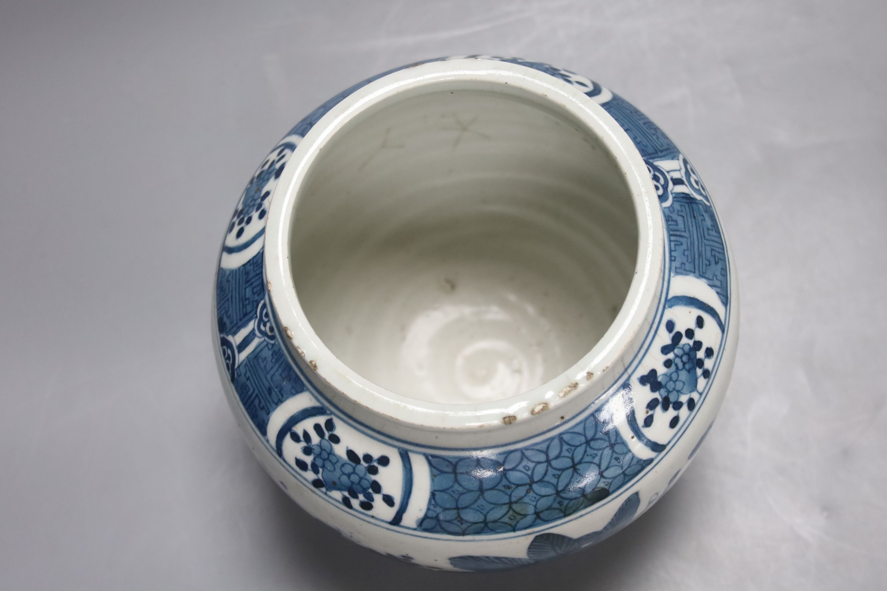 A Japanese Arita blue and white dish with scalloped edge, 29cm diameter and a modern Chinese jar